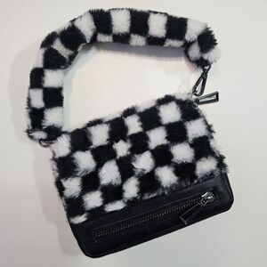 No Boundaries Fuzzy Checkered Wristlet